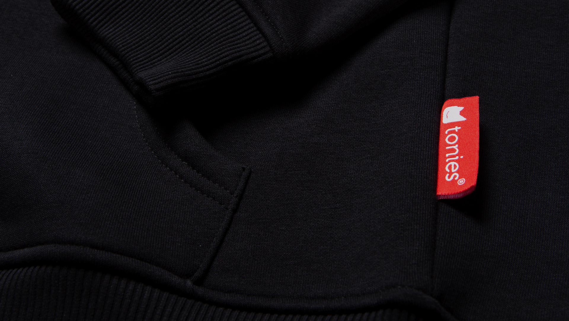 Detailed view of a flag label for corporate fashion.